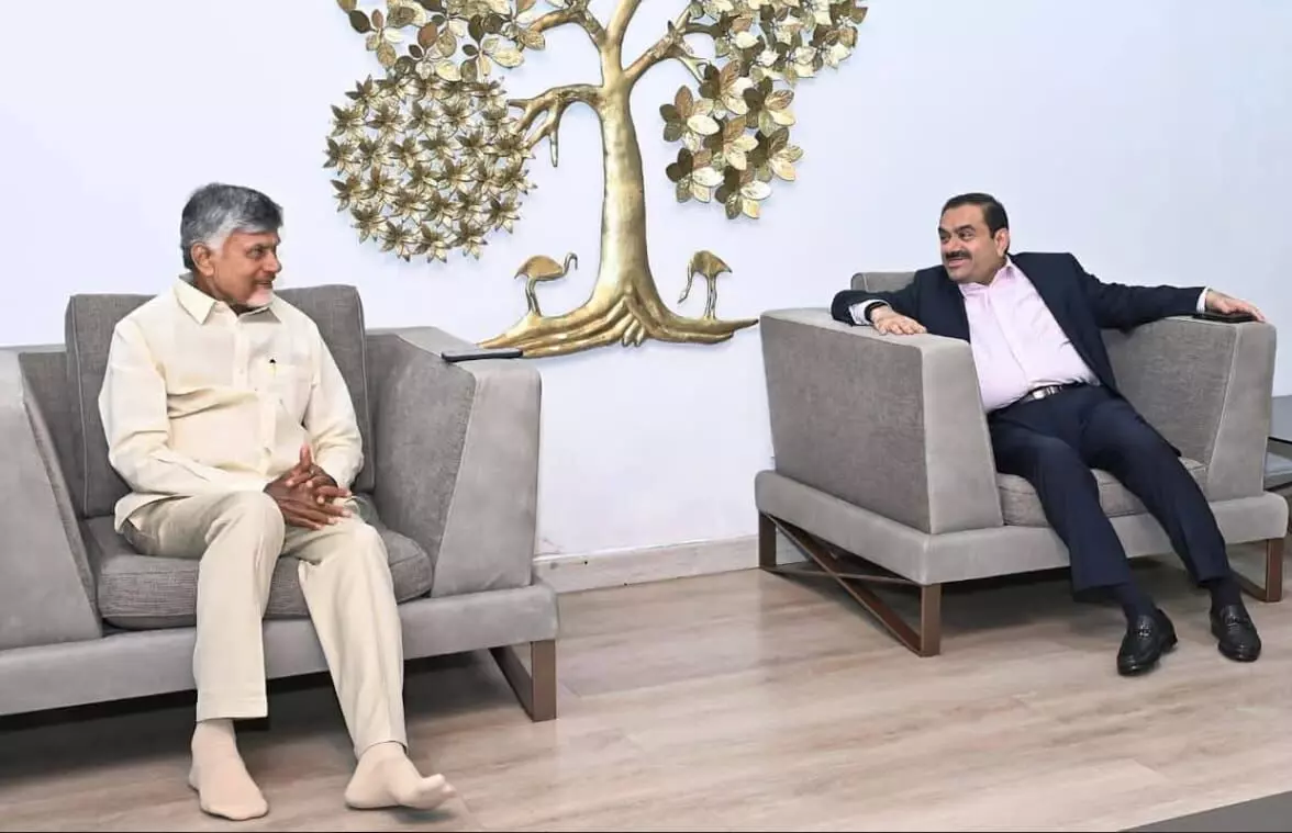 Viral Photos Fuel Talk: ‘CM Sitting Too Submissively Before Adanis’!